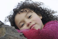 Young child daydreaming